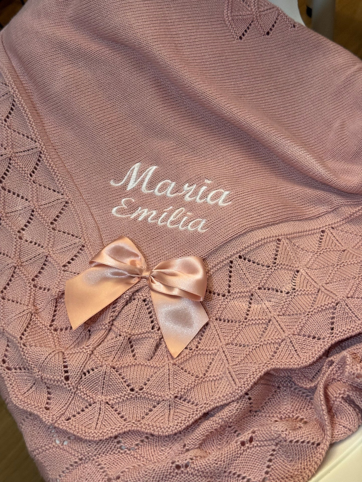 Xaile bebé com laço