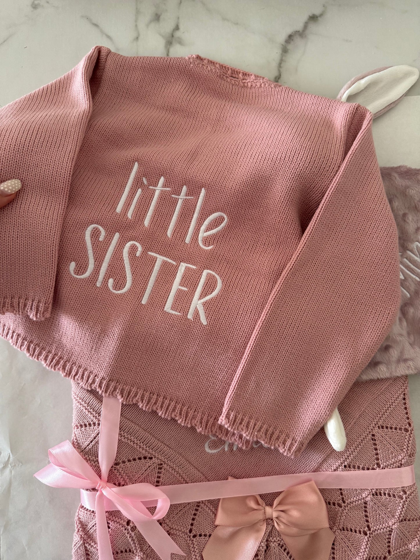 Casaco malha com laço